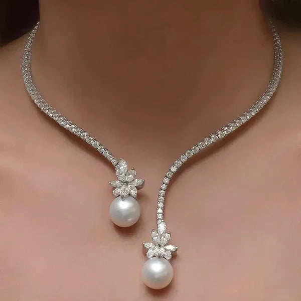 1+1 Offer: Elegant shiny necklace with pearls made of silver + Emerald Cut White Sapphire Bracelet