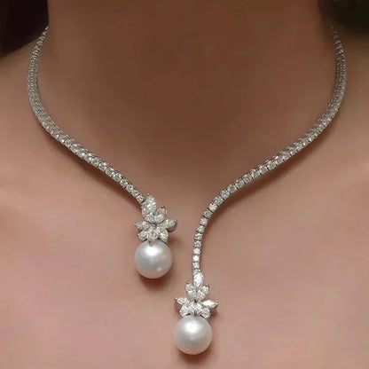 1+1 Offer: Elegant shiny necklace with pearls made of silver + Emerald Cut White Sapphire Bracelet